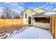 Backyard with wooden fence and small patio at 2101 S Lafayette St, Denver, CO 80210