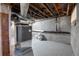 Unfinished basement with furnace and plumbing at 2101 S Lafayette St, Denver, CO 80210