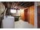 Basement laundry area with washer, dryer, and sink at 2101 S Lafayette St, Denver, CO 80210