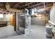 Unfinished basement with furnace and plumbing at 2101 S Lafayette St, Denver, CO 80210