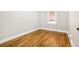 Bright bedroom with hardwood floors and neutral-toned walls at 2101 S Lafayette St, Denver, CO 80210