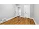 Spacious bedroom with hardwood floors and neutral wall colors at 2101 S Lafayette St, Denver, CO 80210
