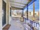 Front porch with ornate railing and street view at 2101 S Lafayette St, Denver, CO 80210