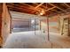 Unfinished garage interior with chain link dividers at 2101 S Lafayette St, Denver, CO 80210