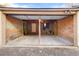 Unfinished garage interior with brick walls at 2101 S Lafayette St, Denver, CO 80210