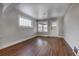 Spacious living room with hardwood floors and lots of natural light at 2101 S Lafayette St, Denver, CO 80210