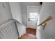 Wooden stairs leading to the lower level of the home at 2101 S Lafayette St, Denver, CO 80210