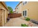 Backyard patio with garden bed; a private space for relaxation and entertaining at 22801 E Briarwood Pl, Aurora, CO 80016