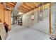 Unfinished basement providing ample space for storage or customization at 22801 E Briarwood Pl, Aurora, CO 80016