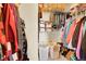 Walk-in closet with shelving and organized storage solutions at 22801 E Briarwood Pl, Aurora, CO 80016