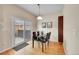 Dining area features sliding doors to the patio and modern decor at 22801 E Briarwood Pl, Aurora, CO 80016