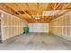 Spacious two-car garage offering ample parking and storage space at 22801 E Briarwood Pl, Aurora, CO 80016