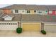 Attached garages with ample parking space, offering convenience and security for residents at 22801 E Briarwood Pl, Aurora, CO 80016