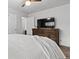 Spacious bedroom with a TV, closet and carpet creates a relaxing and inviting retreat at 3667 Hudson St, Denver, CO 80207