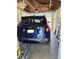 View of a car parked inside the home's garage at 3667 Hudson St, Denver, CO 80207