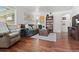 Inviting living room showcases hardwood floors, comfortable seating, and ample natural light at 3667 Hudson St, Denver, CO 80207