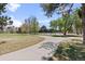 View of a walking path near the property on a sunny day at 3667 Hudson St, Denver, CO 80207
