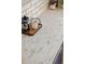 Close-up on marble countertop with coffee setup and decor, adding a touch of elegance at 9763 Cove Creek Dr, Highlands Ranch, CO 80129