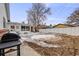 Backyard with grill and circular patio area at 1441 E 84Th Pl, Denver, CO 80229