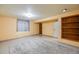 Finished basement room with built-in shelving at 1441 E 84Th Pl, Denver, CO 80229