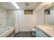 Basement bathroom with a tub and shower at 1441 E 84Th Pl, Denver, CO 80229