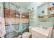 Clean bathroom with a shower/tub combo and a nautical theme at 1441 E 84Th Pl, Denver, CO 80229