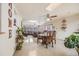 Bright dining area with wooden table and chairs, open to living room at 1441 E 84Th Pl, Denver, CO 80229