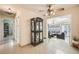 Bright hallway with a view into the living room at 1441 E 84Th Pl, Denver, CO 80229