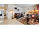 Living area featuring leather sofas and a view into hallway at 1441 E 84Th Pl, Denver, CO 80229