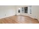 Bright living room with hardwood floors, bay windows, and neutral paint, perfect for a cozy and inviting space at 5294 S Espana St, Centennial, CO 80015