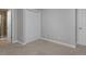 This home's bedroom has neutral paint, plush carpet, and lots of light at 2500 Lexington St, Lafayette, CO 80026
