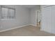 Inviting bedroom featuring large window, neutral paint, plush carpet, and closet at 2500 Lexington St, Lafayette, CO 80026