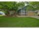 Charming two-story home with a well-maintained front yard and a cozy covered porch at 2500 Lexington St, Lafayette, CO 80026