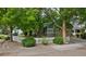 Beautiful home featuring a well-manicured lawn, charming white picket fence, and mature trees at 2500 Lexington St, Lafayette, CO 80026