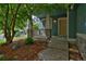 Inviting covered porch with stone accents and wood railings offering curb appeal at 2500 Lexington St, Lafayette, CO 80026