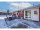 Patio with seating area and access to the house at 5986 S Cook St, Littleton, CO 80121