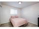 Bedroom with a full-size bed and window coverings at 5986 S Cook St, Littleton, CO 80121