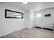 Light and airy entryway with a full-length mirror and hardwood floors at 5986 S Cook St, Littleton, CO 80121