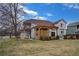 Charming backyard featuring a beautiful pergola-covered patio, perfect for outdoor relaxation and entertaining at 7084 Moss Ct, Arvada, CO 80007