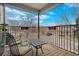 Balcony view overlooking neighborhood with wrought iron railing at 7084 Moss Ct, Arvada, CO 80007