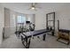 Bright bedroom with exercise equipment and a ceiling fan, creating a versatile space at 7084 Moss Ct, Arvada, CO 80007