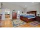 Spacious main bedroom with an ensuite bathroom and access to a private balcony at 7084 Moss Ct, Arvada, CO 80007