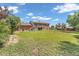 Expansive backyard featuring a lush lawn with partial fence, patio and deck, perfect for outdoor enjoyment at 8759 Seton St, Westminster, CO 80031