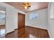 Bedroom with hardwood floors, closet, window, and ceiling fan at 8759 Seton St, Westminster, CO 80031
