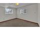 Bedroom features carpeted floor and two windows at 8759 Seton St, Westminster, CO 80031