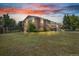 A classic home boasts lush greenery, a well-maintained lawn, and traditional architectural design at 8759 Seton St, Westminster, CO 80031