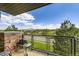 Relaxing balcony with a grill, offering scenic views and outdoor enjoyment at 9019 E Panorama Cir # D218, Englewood, CO 80112