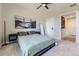 Spacious bedroom with a serene ambiance, modern decor, and easy access to the hallway at 9019 E Panorama Cir # D218, Englewood, CO 80112