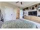 Bright bedroom featuring modern decor and a spacious layout, complete with a storage cabinet at 9019 E Panorama Cir # D218, Englewood, CO 80112