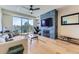 Bright and modern living room with a fireplace and balcony at 9019 E Panorama Cir # D218, Englewood, CO 80112